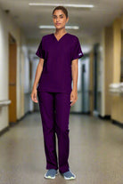 a woman wearing a scrub suit 